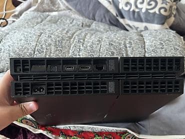 Техника и электроника: Игровая консоль Sony PlayStation 4 (первая версия, “Fat”), чёрный — 1