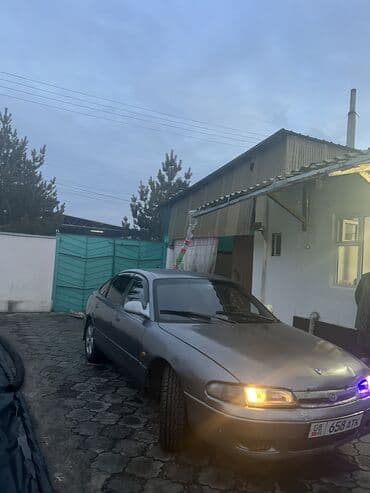 аккумулятор для машины: Mazda 626: 1994 г., Хетчбек — 10