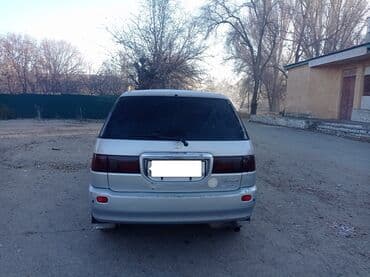 камера на зил: Toyota Ipsum: 1999 г. — 5