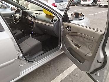 Chevrolet Lacetti: 2008 г., 1.6 л, Кол менен иштөөчү, Бензин, Универсал — 8