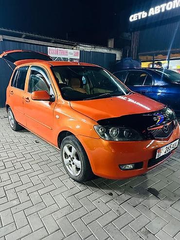 Mazda Demio: 2003 г., 1.5 л, Автомат, Бензин, Хэтчбэк