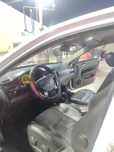 чанган уни к: Chevrolet Epica: 2010 г., 2 л, Автомат, Газ, Седан — 3