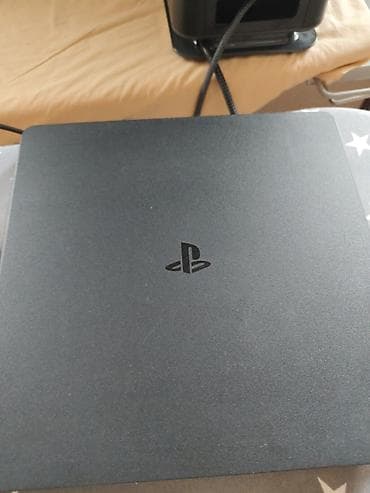 PlayStation 4 Slim, черный Комплектация: - консоль PlayStation 4 Slim