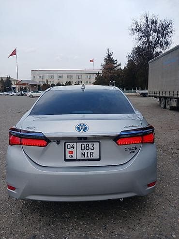 кузов авто: Toyota Corolla: 2019 г., Автомат, Гибрид, Седан — 9