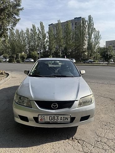 Mazda 323: 2002 г., 1.6 л, Автомат, Бензин, Хэтчбэк