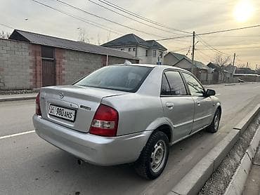 mg zr: Mazda 323: 2003 г., 1.6 л, Механика, Бензин, Седан — 2
