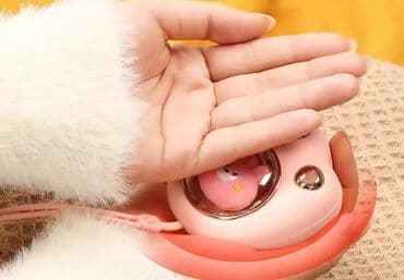 электрическая кастрюля: Карманный электрическая грелка форме лапки. Цвет розовый, время — 4