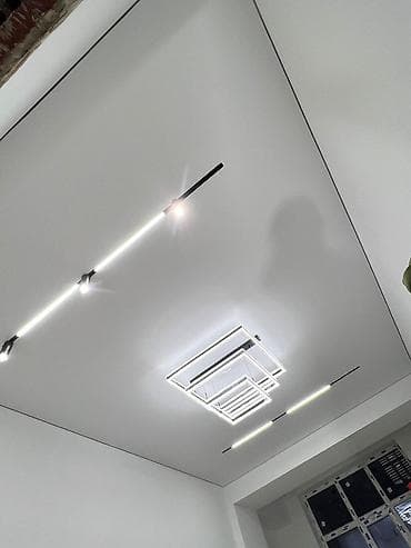 фотогра: Натяжные потолки с интегрированным освещением под ключ - Современные — 7