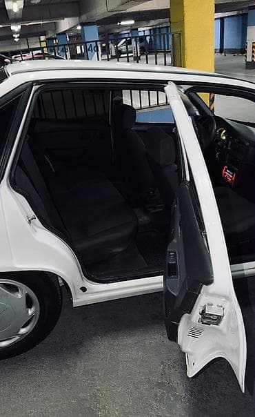mini cuper: Daewoo Nexia: 2012 г., 1.6 л, Механика, Бензин, Седан — 7