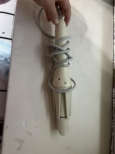 a 72: Это автоматическая плойка (стайлер) для волос, предназначенная для — 2