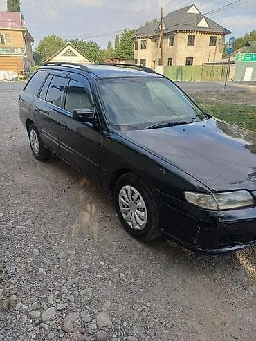 Транспорт: Mazda Capella: 1998 г., 2 л, Автомат, Универсал — 3