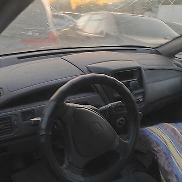 зузуки лиана: Suzuki Liana, серебристый хэтчбек/седан (KG номера 06 • 136 APV) — 2