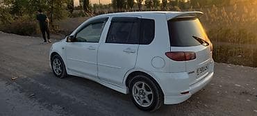 продаю рассрочку: Mazda Demio: 2003 г., Бензин — 6
