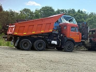 Самосвал КАМАЗ 6x4 с гидроподъёмом кузова 55111 год 2004 транзит в