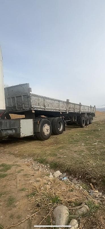 продам мебель б: Полуприцеп бортовой на тигачи 3 ось линивиц есть в KG номер — 5