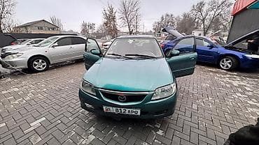 r18 255 55: Mazda 323: 2003 г., 1.6 л, Автомат, Бензин, Универсал — 3