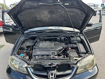 одиссеи: Honda Odyssey: 2002 г., 3 л, Автомат, Бензин, Минивэн — 9