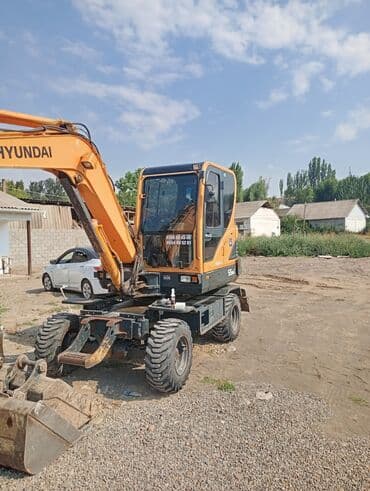 органайзеры для авто: Экскаватор, Hyundai, 2013 г., Колесный — 5