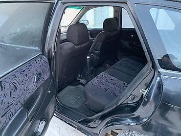 мазда эфка 323: Mazda 323: 2000 г., 1.8 л, Механика, Бензин, Универсал — 7