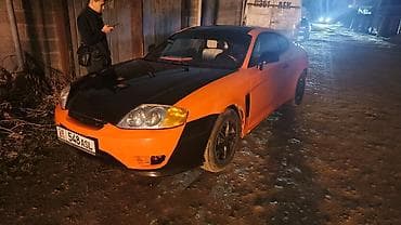 Hyundai Tuscani: 2002 г., 1.9 л, Бензин, Купе — 1