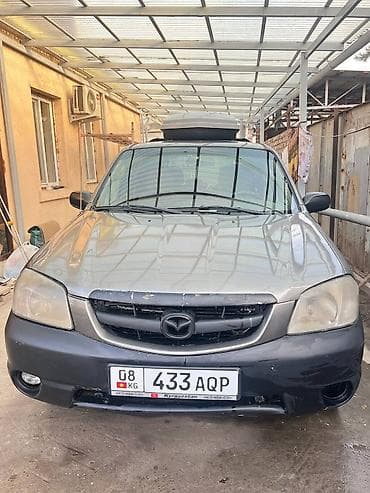Mazda Tribute: 2003 г., 2 л, Механика, Бензин, Кроссовер