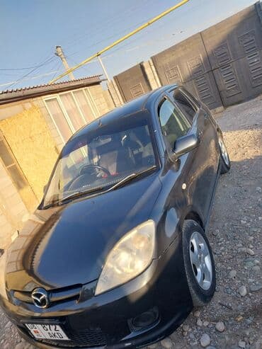 авто в аренду с последующим выкупом в бишкеке: Mazda Demio: 2006 г., 1.3 л, Автомат, Бензиновая, Хэтчбэк — 4