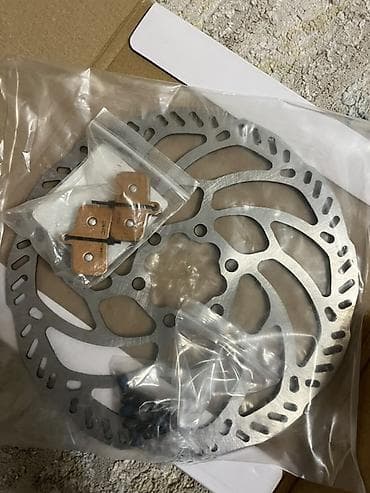 велосе: Пара тормозных дисков и пара колодок на Суррон Лайт би х — 1