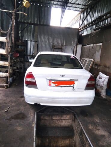 купить диски штампованные r15: Daewoo Nubira: 1999 г., 1.6 л, Механика, Бензиновая — 4