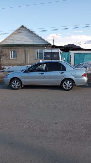 Mitsubishi Lancer: 2003 г., 1.6 л, Механика, Бензин, Седан