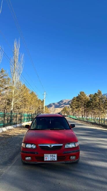 опель вектра с: Mazda 626: 1998 г., 2 л, Механика, Бензиновая, Универсал — 6