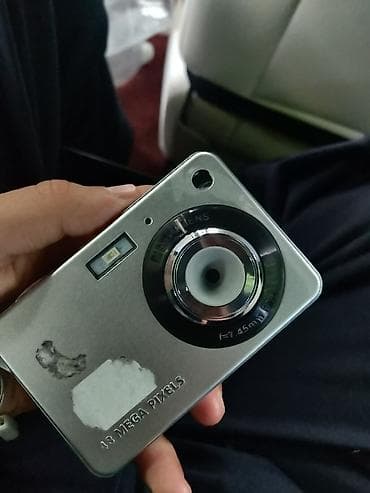 Цифровая компакт‑камера 18 MP - Матрица: 18 мегапикселей (надпись на