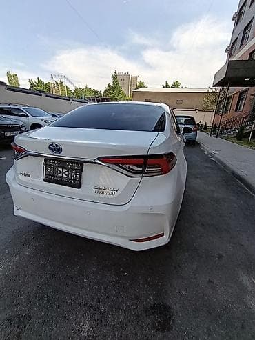 на corolla: Toyota Corolla: 2022 г., 1.8 л, Вариатор, Гибрид, Седан — 4