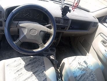 нарди руль: Mazda Demio: 1998 г., 1.3 л, Механика, Бензин, Хэтчбэк — 6