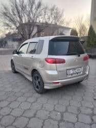 помощь авто: Mazda Demio: 2003 г., 1.3 л, Автомат, Бензин, Седан — 2