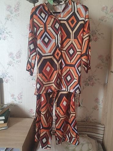 Продаю Новый шикарный стильный шелковый костюм.Размер на 46,48 и 50 — 1