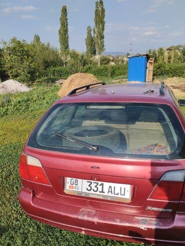 машина зил: Nissan Primera: 2000 г., 2 л, Механика, Бензин, Универсал — 1