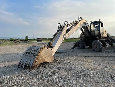 штанговый мотор или цепной: Экскаватор, 2003 г., Колесный — 2