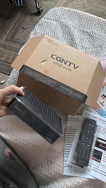 CGNTV — интернет-приставка (IPTV/OTT) с пультом ДУ Комплектация: -