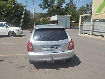 буксир: Mazda 323: 2003 г., Механика, Бензин, Универсал — 4