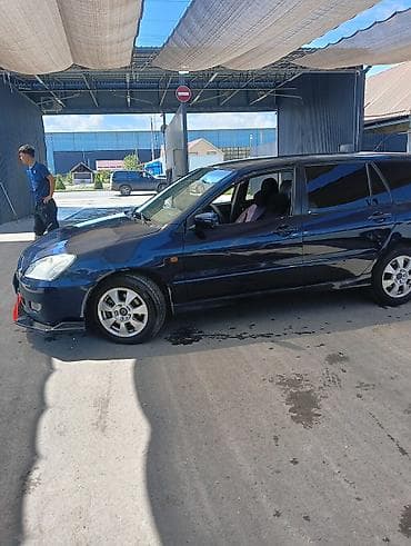 Унаа: Mitsubishi Lancer: 2005 г., 2 л, Кол менен иштөөчү, Бензин, Универсал — 5