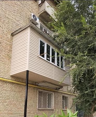 Услуга: вынос и остекление балконов/лоджий с усилением и обшивкой “под
