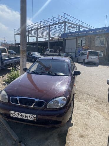 мерседес 124 2 3: Автомобиль Daewoo Lanos в кузове седан, выполненный в темно-бордовом — 5