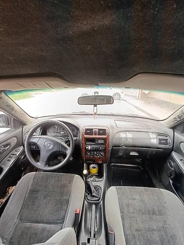 матор кайык: Mazda 626: 1999 г., Кол менен иштөөчү, Бензин, Седан — 5