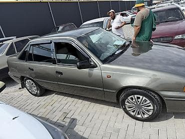 колонку: Daewoo Nexia: 2003 г., 1.6 л, Ручные, Бензин, Седан — 3