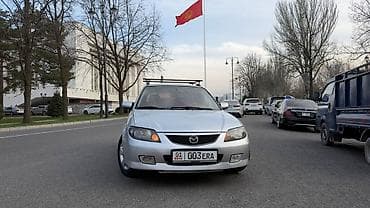 подоколник: Mazda Familia: 2003 г., 1.6 л, Бензин, Универсал — 3