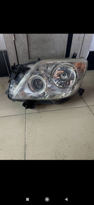 Передняя левая фара Toyota 2010 г., Б/у, Оригинал, Япония at lalafo.kg Передняя левая фара Toyota 2010 г., Б/у, Оригинал, Япония
