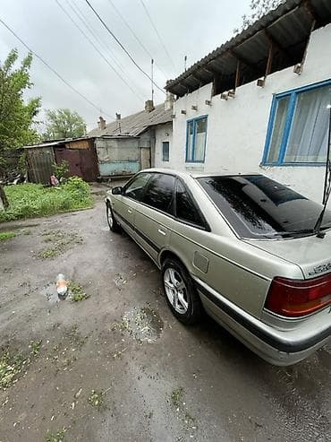 Mazda 626: 1990 г., 2 л, Механика, Бензин, Хэтчбэк — 4