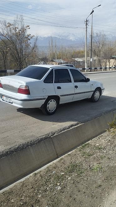 неки: Daewoo Nexia: 2003 г., Седан — 2