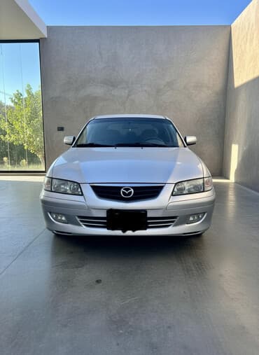 купить трактор мтз: Mazda 626: 2001 г., 2 л, Механика, Бензиновая, Седан — 2