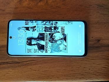 1000 сом продаю редми 10 2022 белый 64 гб на экране есть полоска на